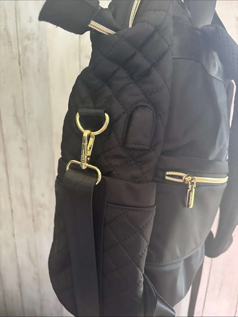 Stylish Quilted Black Backpack with Gold Hardware